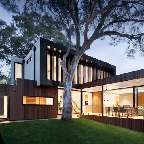 a house with a tree in the back